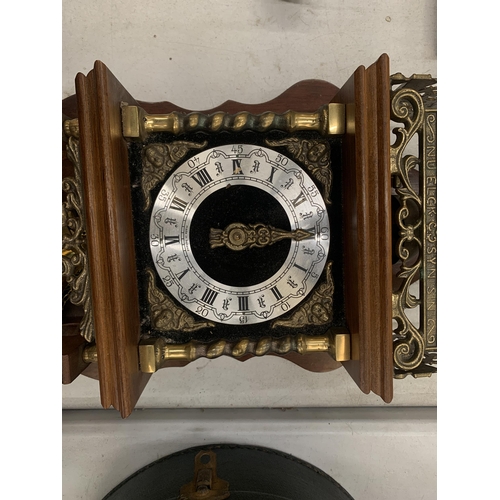 203 - A SWISS WALL CLOCK WITH BRASS WEIGHTS