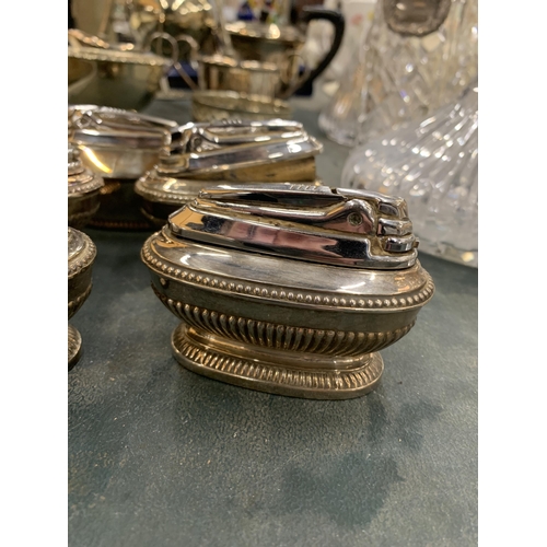 208 - A GROUP OF FIVE VINTAGE SILVER PLATED TABLE LIGHTERS