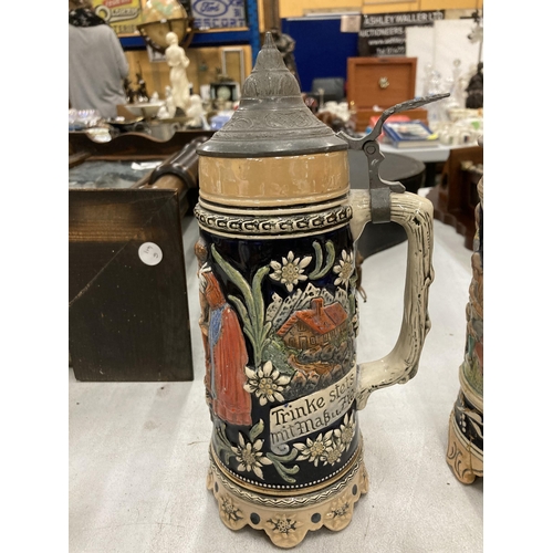 236A - A COLLECTION OF VINTAGE GERMAN BEER STEINS WITH MUSICAL EXAMPLE