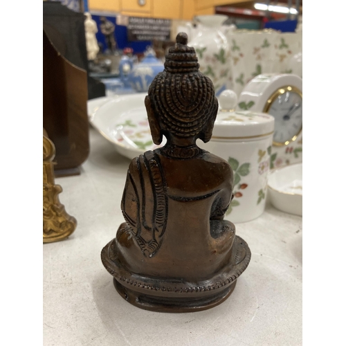 241 - A BRONZE TIBETAN HEALING BUDDAH