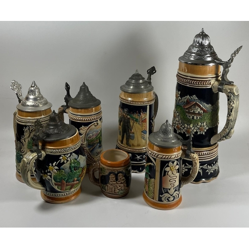 101 - A COLLECTION OF SEVEN VINTAGE GERMAN BEER STEINS, LARGEST 28 CM