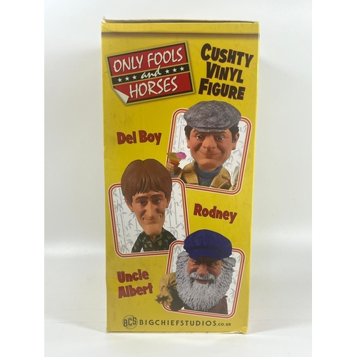 108 - A BOXED ONLY FOOLS AND HORSES CUSHTY VINYL BOBBLEHEAD GOLD RODNEY FIGURE, 26 X 13 CM