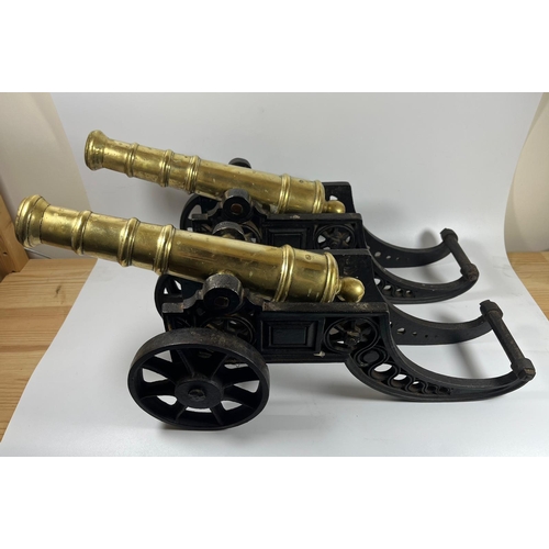 300A - A PAIR OF HEAVY CAST IRON AND SOLID BRASS VINTAGE CANNONS, LENGTH 47 CM