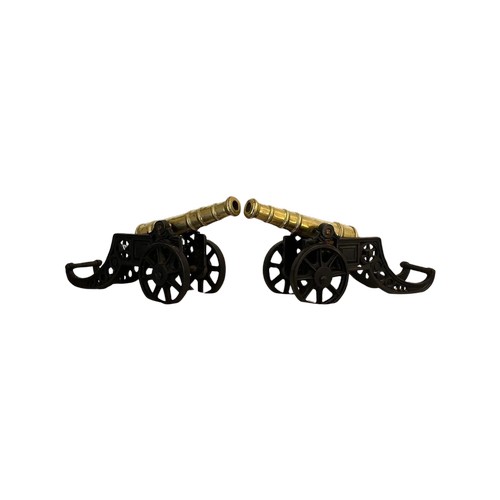 300A - A PAIR OF HEAVY CAST IRON AND SOLID BRASS VINTAGE CANNONS, LENGTH 47 CM