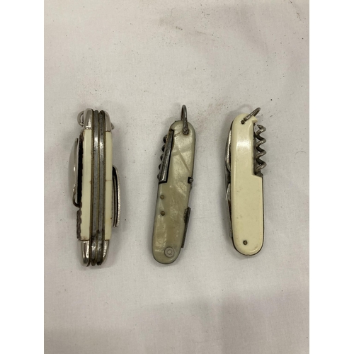 130 - THREE VINTAGE MULTI-TOOL PEN KNIVES