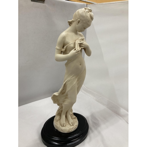 139 - A HEAVY SCULPTURE OF A CLASSICAL MAIDEN ON A WOODEN PLINTH, HEIGHT WITHOUT BASE, 46CM