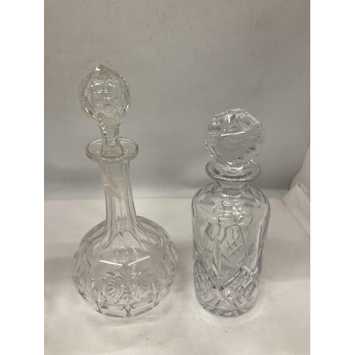 149 - FOUR CUT GLASS DECANTERS OF VARYING SHAPES