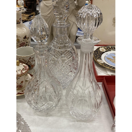 155 - FIVE CUT GLASS DECANTERS OF VARYING SIZES