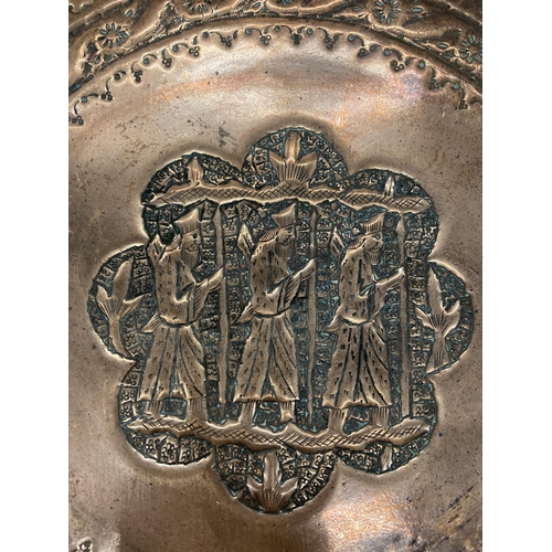 158 - A HEAVY COPPER BENARES PLAQUE 'THE THREE HOLY MEN', DIAMETER 35CM