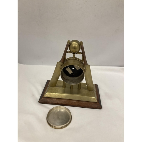 298A - A BRASS MANTLE CLOCK FASHIONED AS CRICKET BATS, STUMPS AND BALL -A/F NO MOVEMENT HEIGHT 22CM