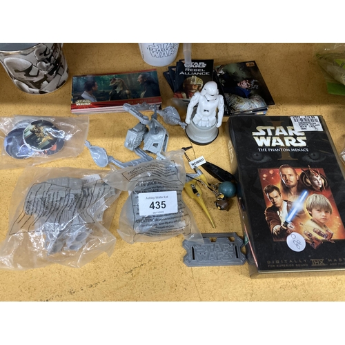 435 - A LARGE COLLECTION OF STAR WARS ITEMS TO INCLUDE A STORMTROOPER MASK, A BOXED SHADOW TROOPER FIGURE,... 