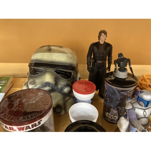 435 - A LARGE COLLECTION OF STAR WARS ITEMS TO INCLUDE A STORMTROOPER MASK, A BOXED SHADOW TROOPER FIGURE,... 