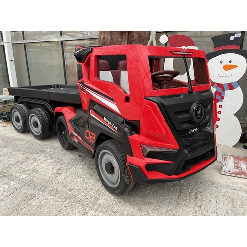 A 'SUPER CAR' BATTERY POWERED CHILDS RIDE ALONG BATTERY WAGON AND