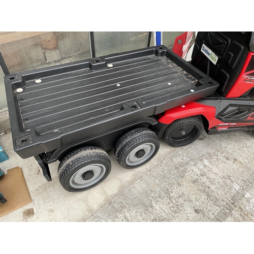 A 'SUPER CAR' BATTERY POWERED CHILDS RIDE ALONG BATTERY WAGON AND