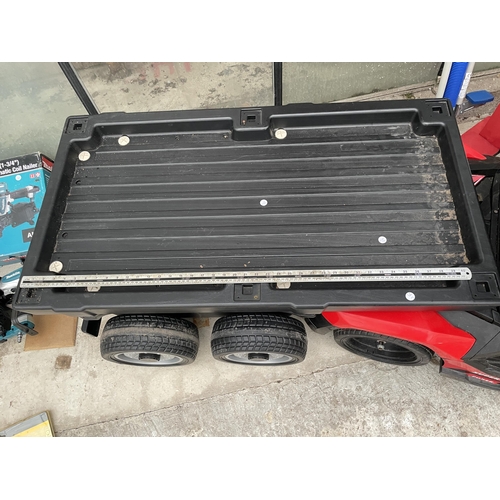 A 'SUPER CAR' BATTERY POWERED CHILDS RIDE ALONG BATTERY WAGON AND