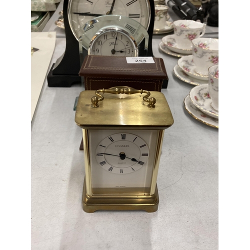 254 - A GROUP OF FIVE ASSORTED CLOCKS TO INCLUDE H.SAMUEL QUARTZ CARRIAGE CLOCK, FRENCH GILT DESIGN EXAMPL... 