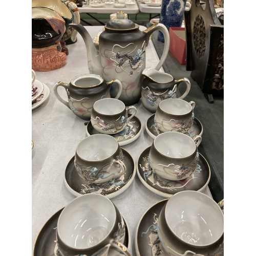 286 - A JAPANESE 'KUTANI' CHINA COFFEE SET WITH DRAGON PATTERN AND TRANSLUCENT BASE TO THE CUPS WITH AN IM... 