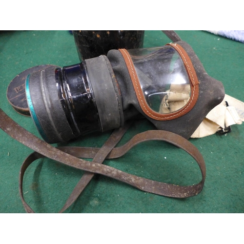 420 - A WORLD WAR II GAS MASK AND TIN