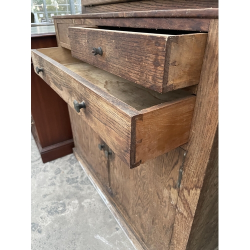 2801 - A MID 20TH CENTURY OAK FRAMED KITCHEN CABINET WITH DROP-DOWN FLAP, WITH ENAMEL WORK SURFACE 36.5