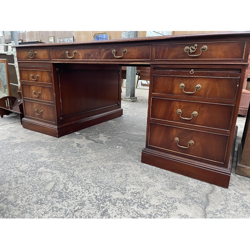 2802 - A 19TH CENTURY STYLE PARTNERS DESK ENCLOSING EIGHT DRAWERS, FILING DRAW, TWO SLIDES AND TWO SHAM DRA... 