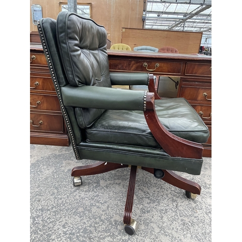 2803 - A 19TH CENTURY STYLE SWIVEL AND ADJUSTABLE DESK CHAIR IN GREEN LEATHER WITH BUTTON-BACK