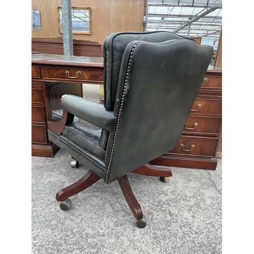 2803 - A 19TH CENTURY STYLE SWIVEL AND ADJUSTABLE DESK CHAIR IN GREEN LEATHER WITH BUTTON-BACK