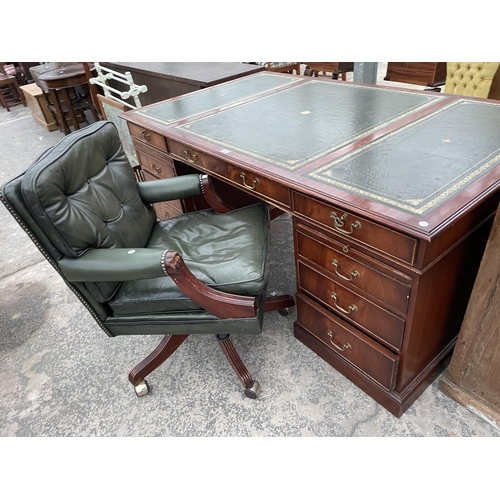 2803 - A 19TH CENTURY STYLE SWIVEL AND ADJUSTABLE DESK CHAIR IN GREEN LEATHER WITH BUTTON-BACK