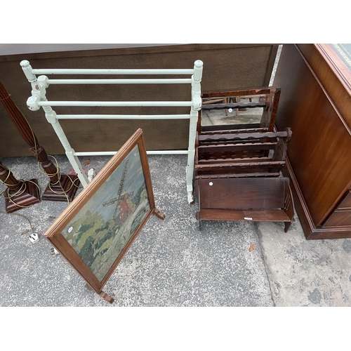 2804 - A BEECH BOOK TROUGH, SPANISH STYLE MAGAZINE RACK, MAHOGANY FRAMED MIRROR, PAINTED FIVE BAR TOWEL RAI... 