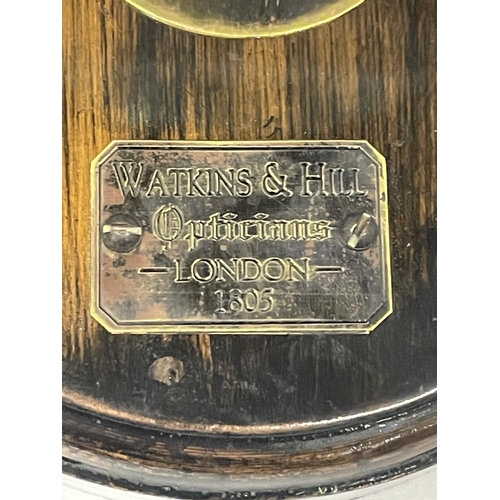 45 - A WATKINS AND HILL MAGNIFYING GLASS ON WOODEN BASE