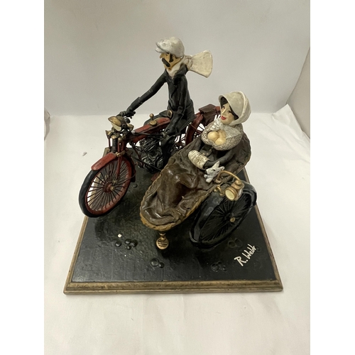 81 - AN UNUSUAL SCULPTURE OF A MAN AND WOMAN ON A MOTORBIKE WITH SIDE CAR, INDISTINCTLY SIGNED, POSSIBLY ... 