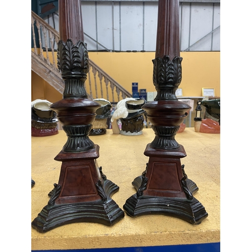 91 - A PAIR OF MODERN ORNATE CANDLE HOLDERS