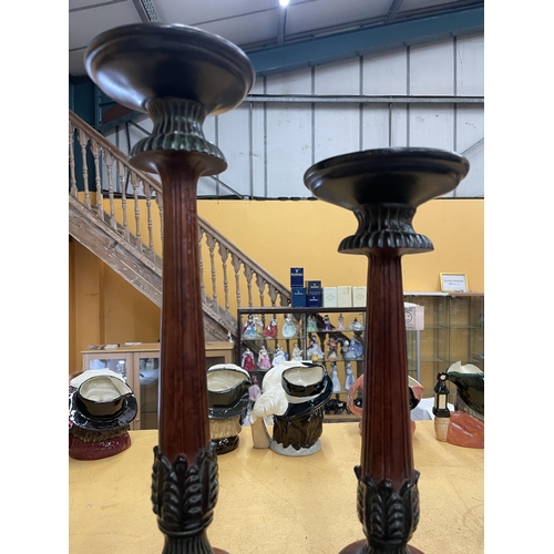 91 - A PAIR OF MODERN ORNATE CANDLE HOLDERS