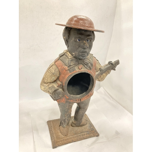 98 - A VINTAGE CAST METAL FIGURE OF A MAN PLAYING THE GUITAR