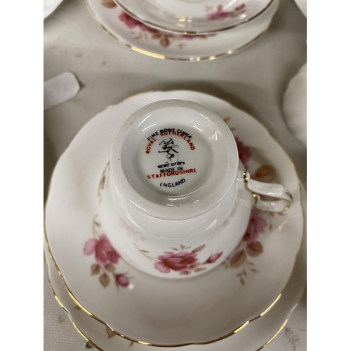 1095 - A PART ROYAL SUTHERLAND PART TEASET TO INCLUDE A COFFEEPOT TOGETHER WITH A FURTHER WHITE TEASET