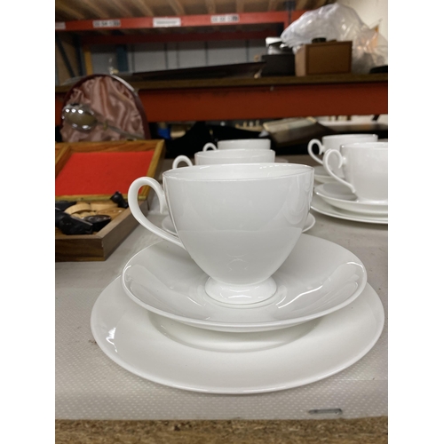 1095 - A PART ROYAL SUTHERLAND PART TEASET TO INCLUDE A COFFEEPOT TOGETHER WITH A FURTHER WHITE TEASET