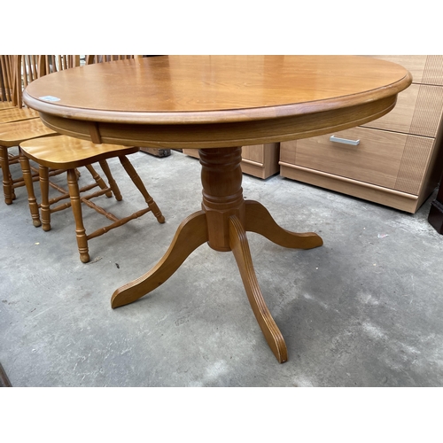 3055 - A CIRCULAR PINE DINING TABLE AND FOUR MATCHING CHAIRS