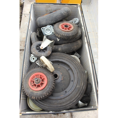 493 - A TRUNK CONTAINING WHEELS  NO VAT