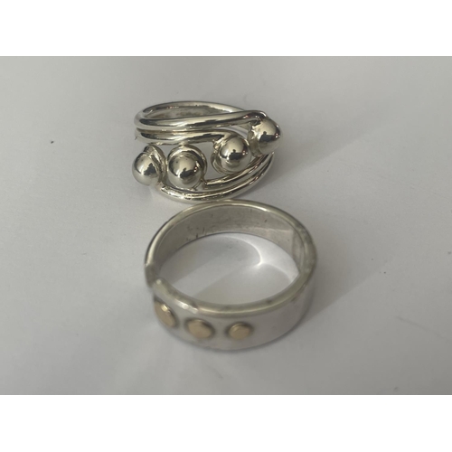 531 - FOUR ASSORTED SILVER RINGS