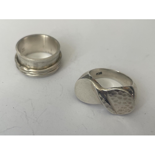 551 - FOUR ASSORTED SILVER RINGS