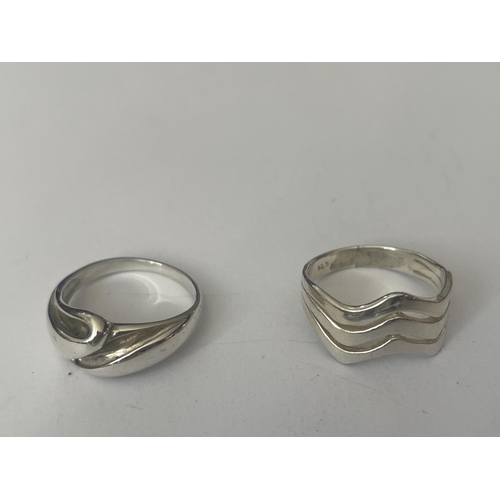 552 - FOUR ASSORTED SILVER RINGS