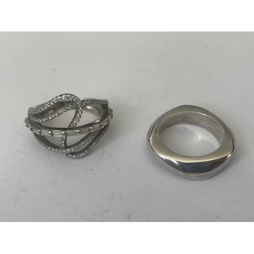 552 - FOUR ASSORTED SILVER RINGS