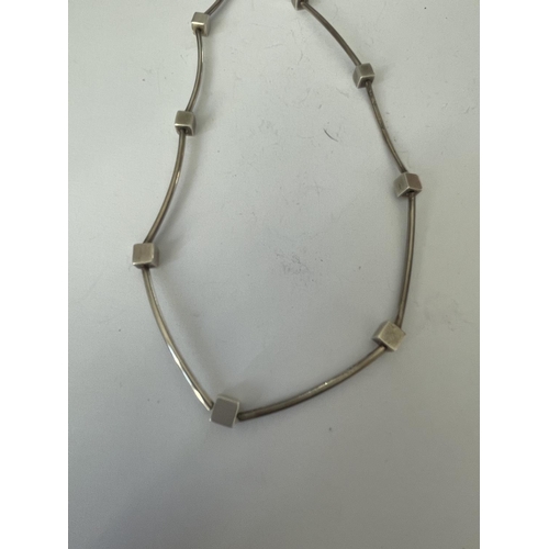 562 - A SILVER DESIGNER NECKLACE