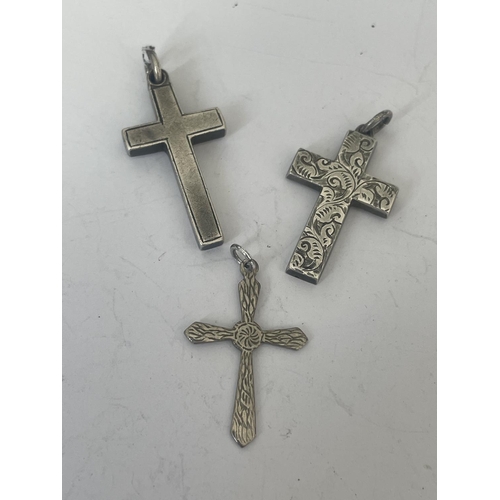 566 - FIVE SILVER CROSSES