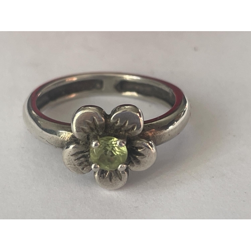 578 - A BOXED SILVER AND PERIDOT RING