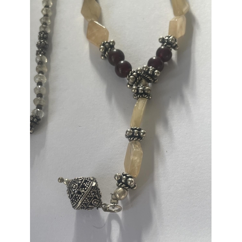 586 - THREE SILVER CLASP AND STONES NECKLACE