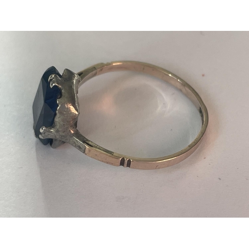 589 - A 9CT GOLD AND SILVER RING