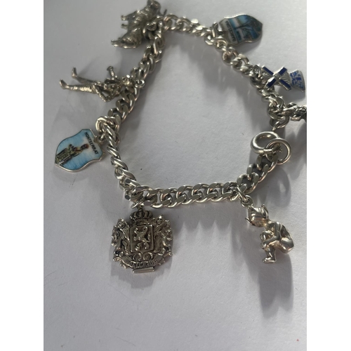 594 - A SILVER CHARM BRACELET