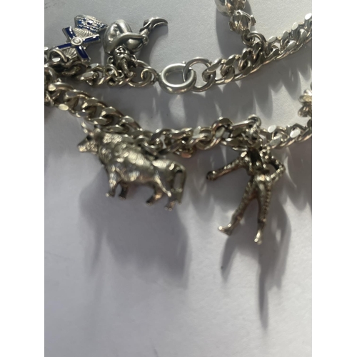 594 - A SILVER CHARM BRACELET