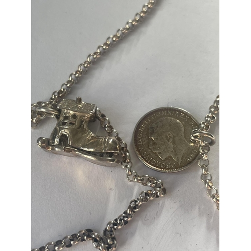 602 - A SILVER CHARM NECKLACE