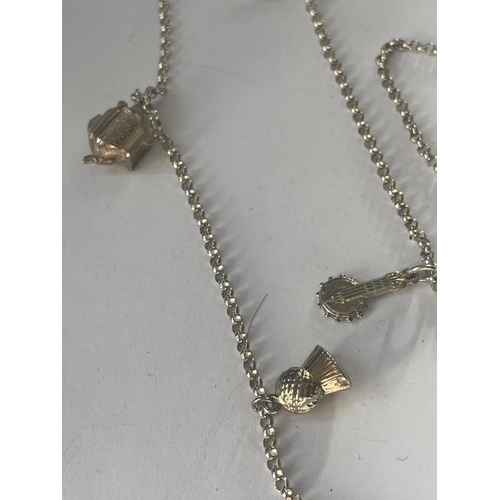 605 - A SILVER CHARM NECKLACE